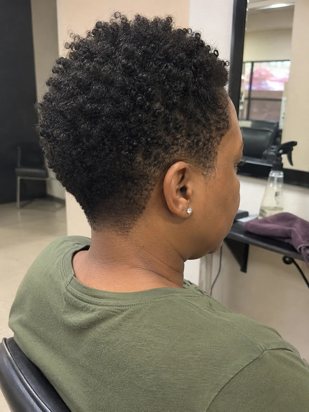 Tapered short natural haircut for black women with volume on top