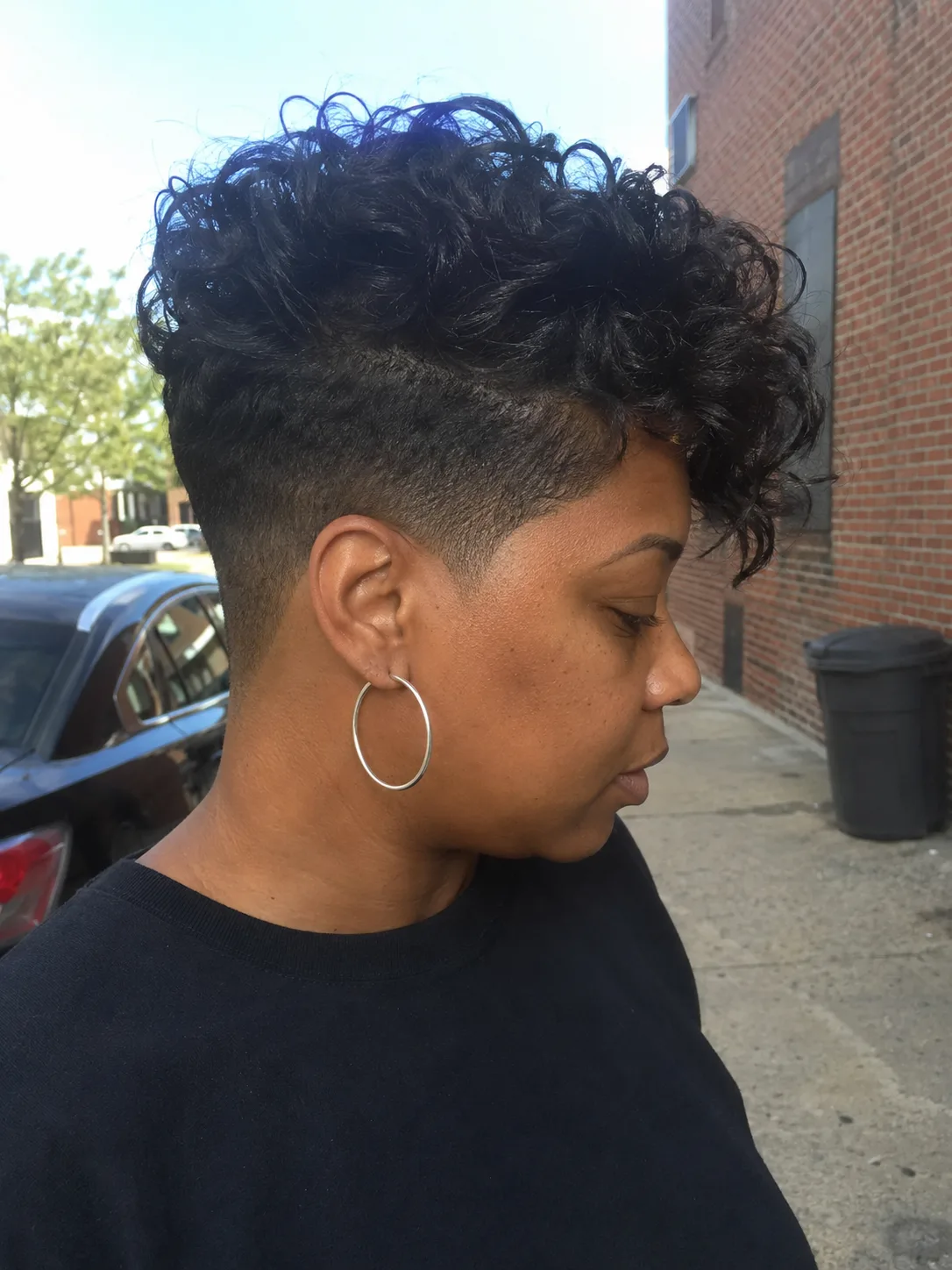 Short layered cut with soft curls for black women