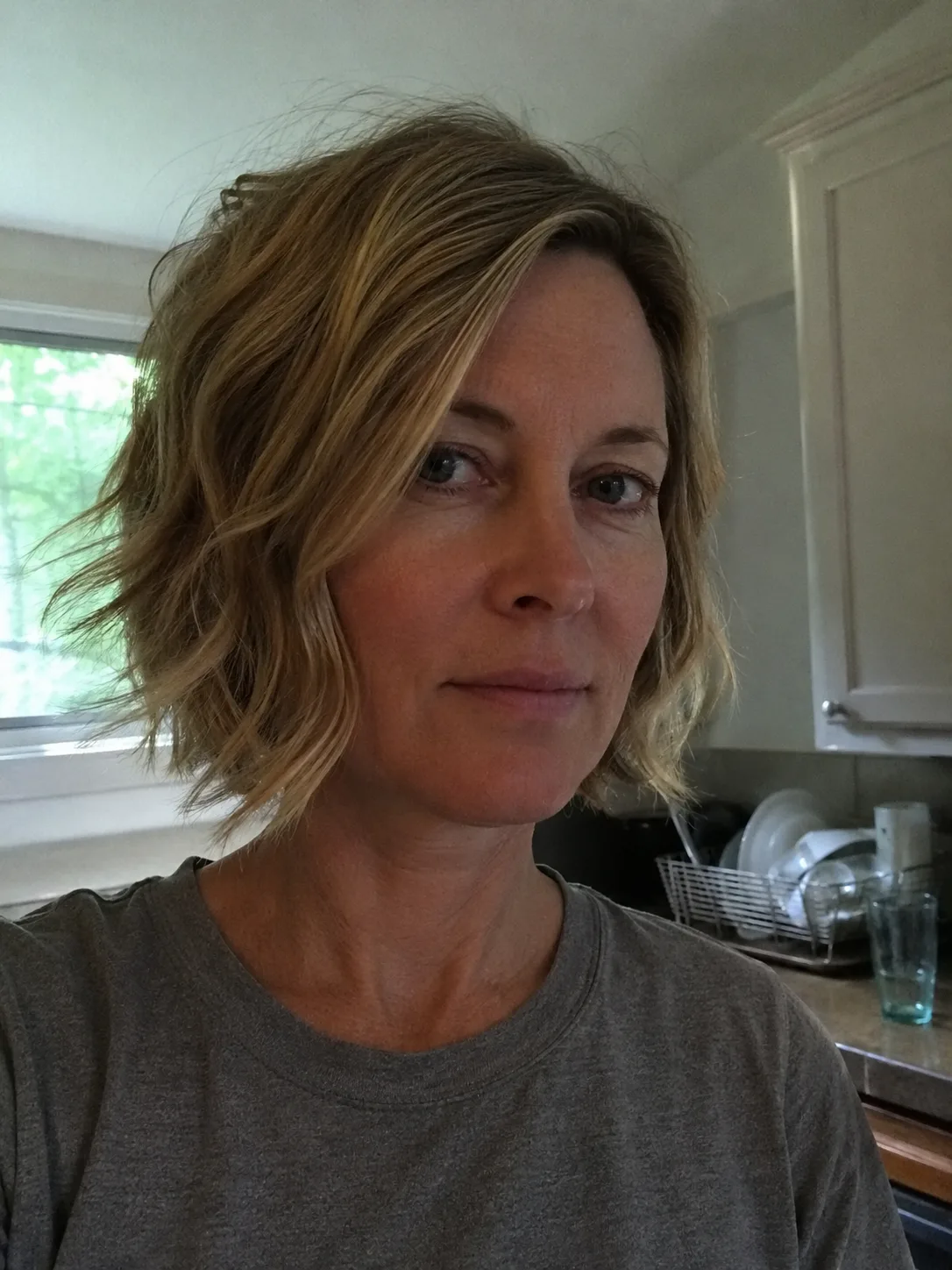 Copper hair highlights on dark hair with bright copper ends and soft beach waves