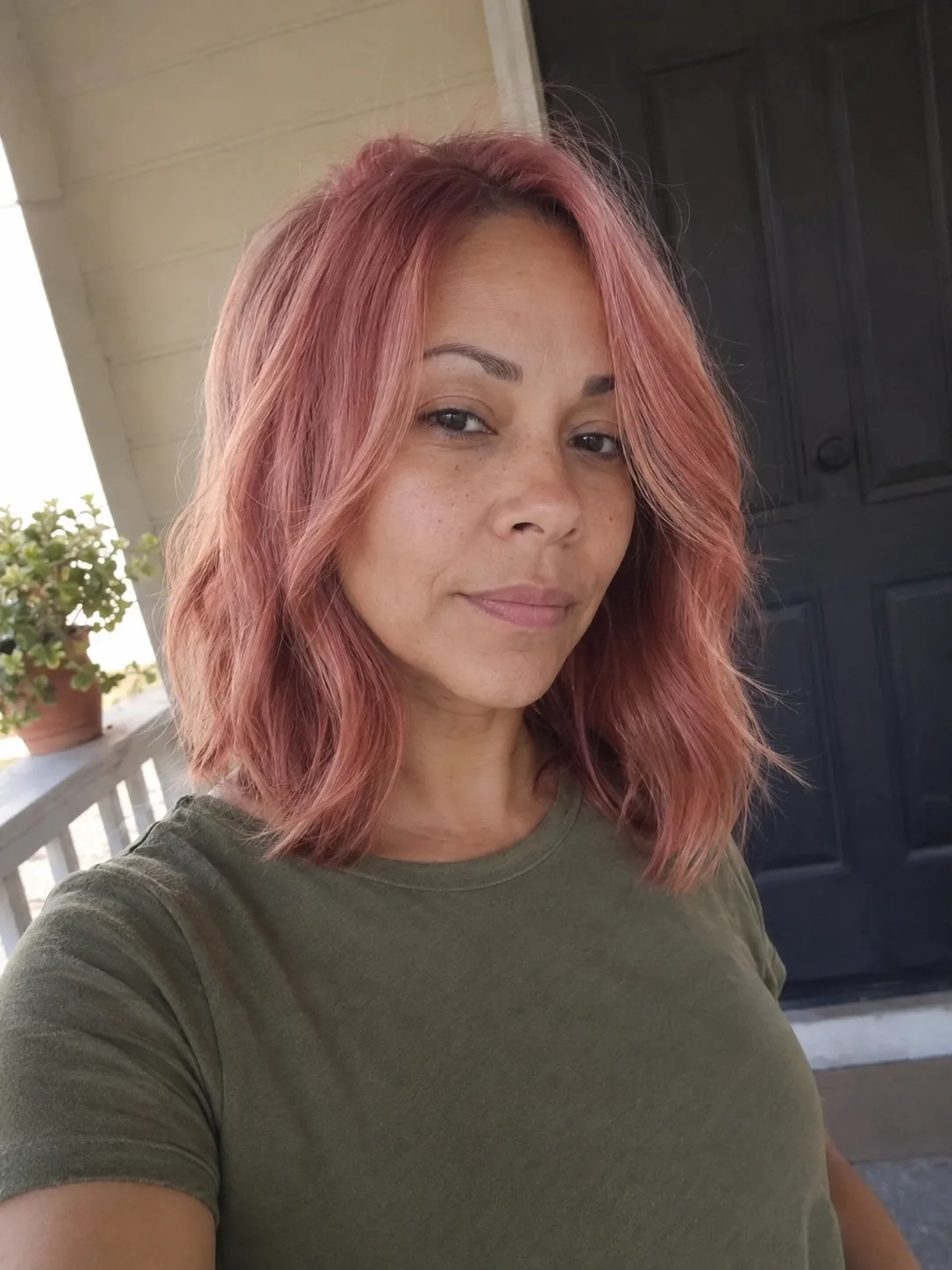 Fuchsia pink ponytail with curled length and volume