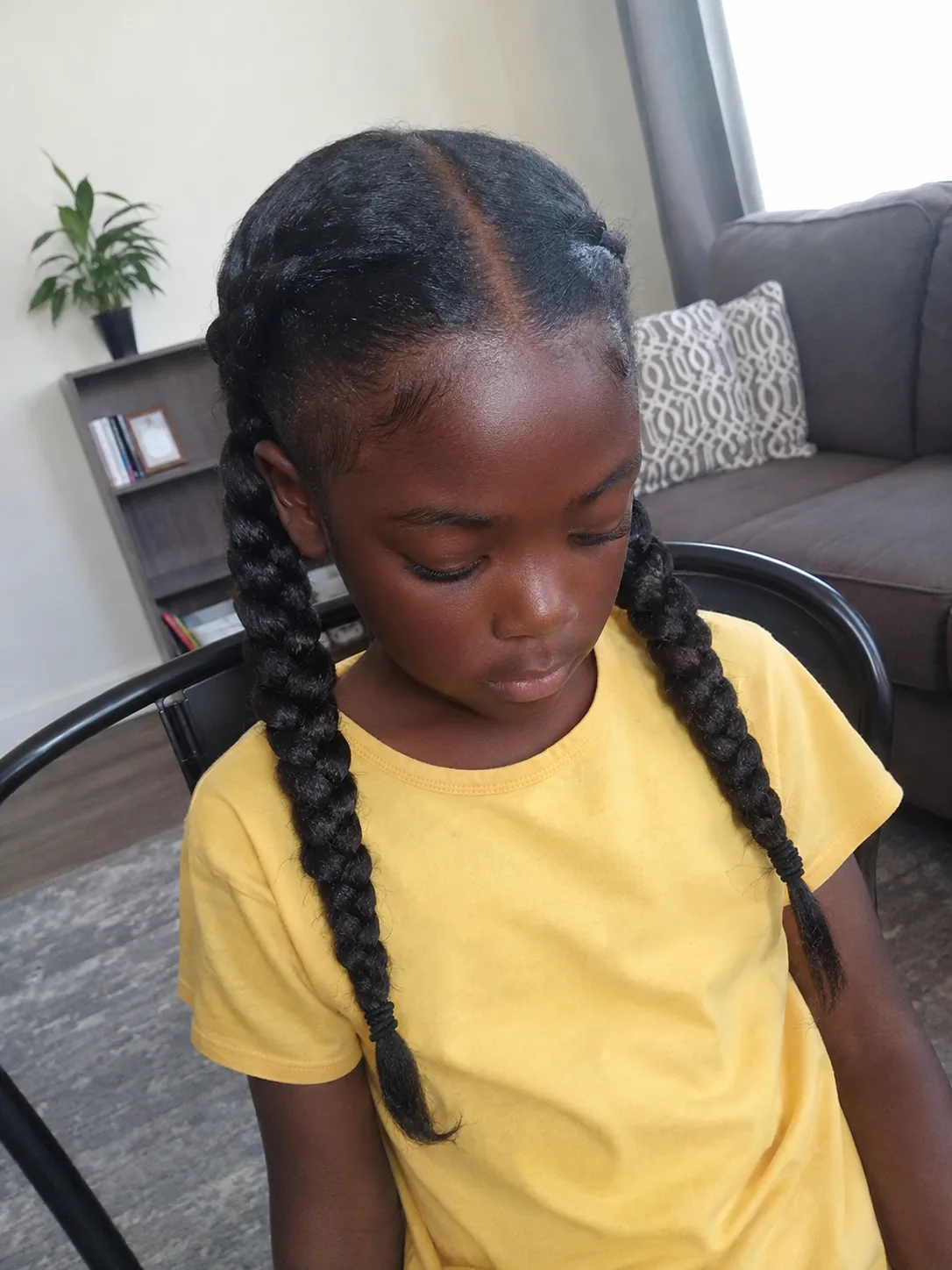 A beautifully styled and secure cute look for children with fine hair texture.
