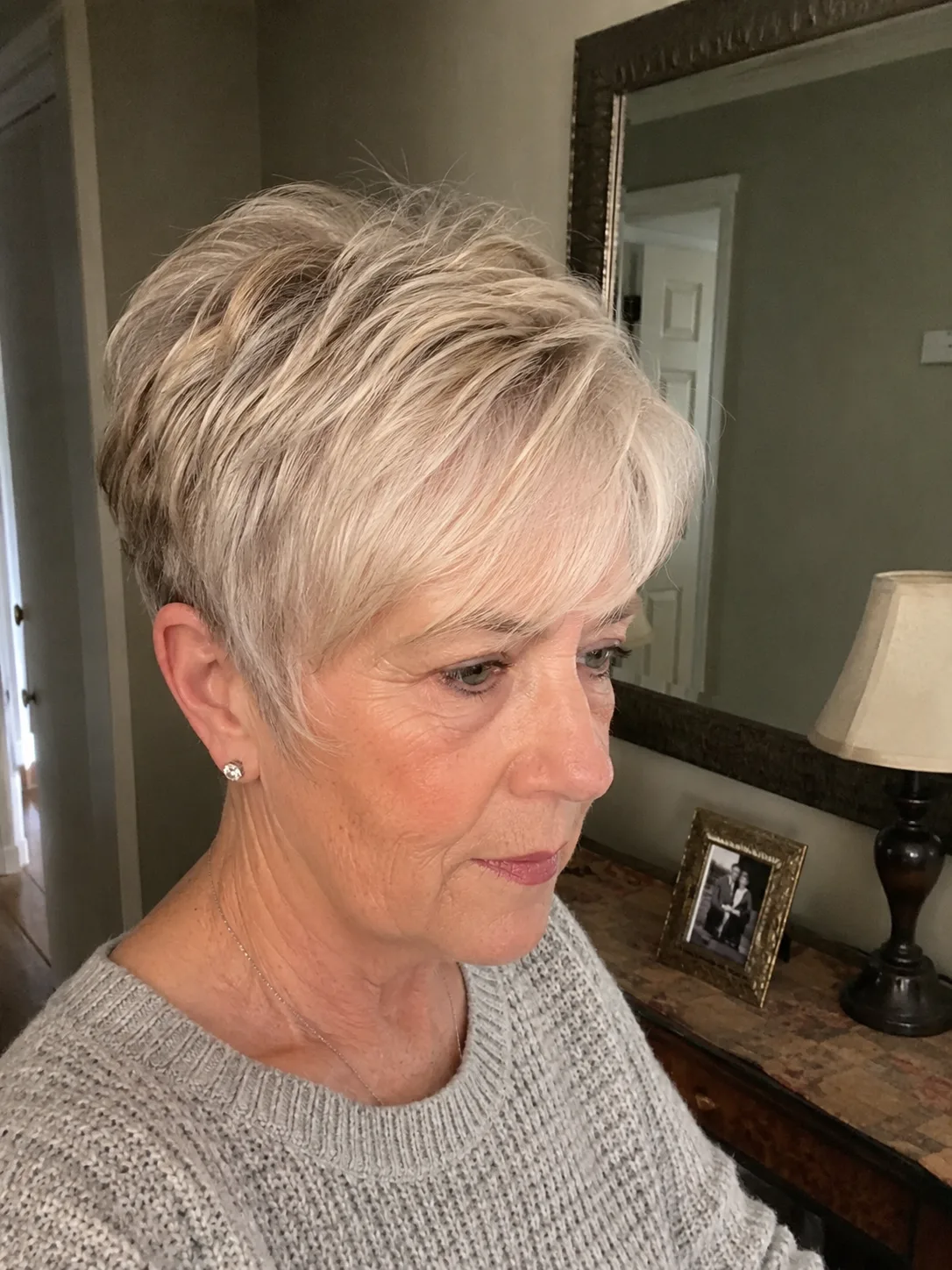 A chic well-proportioned modern stacked bob profile tailored for older women