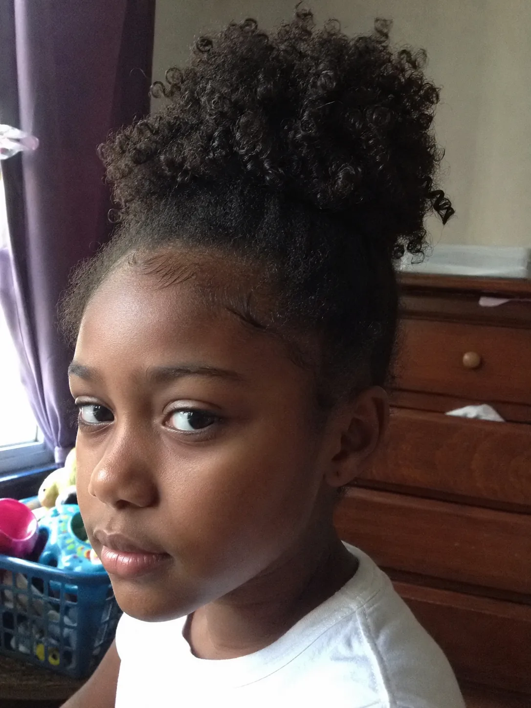 A professional salon environment showing routine kid hair maintenance