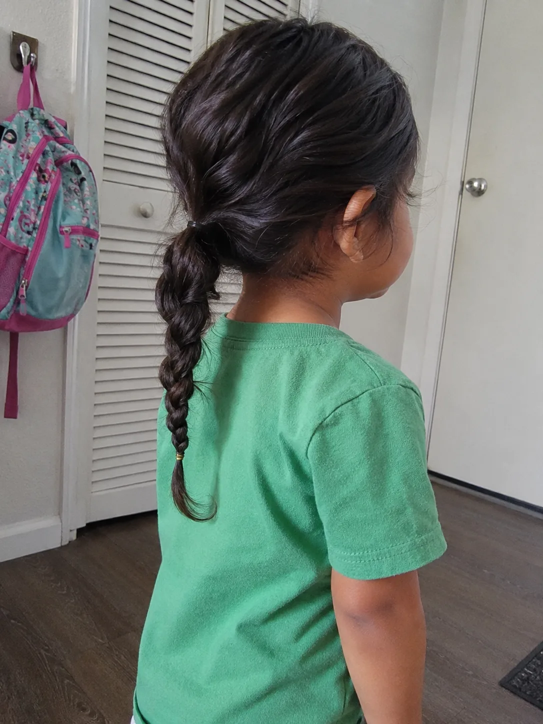 A relaxed young toddler cooperating comfortably during a prioritized fast-cut session