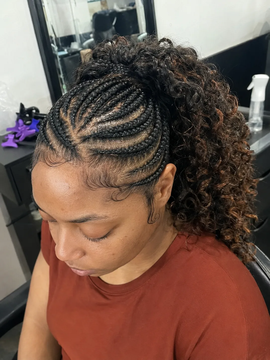 A short, curly haircut that highlights how the shape holds without product interference