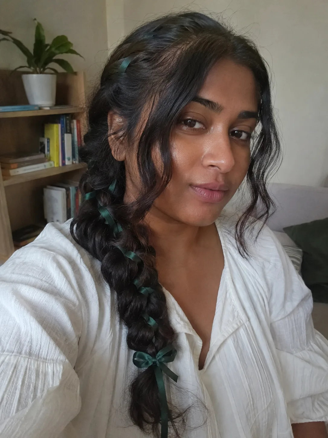 Authentic Ren Faire braided hairstyle updo worn outdoors with natural textured volume.