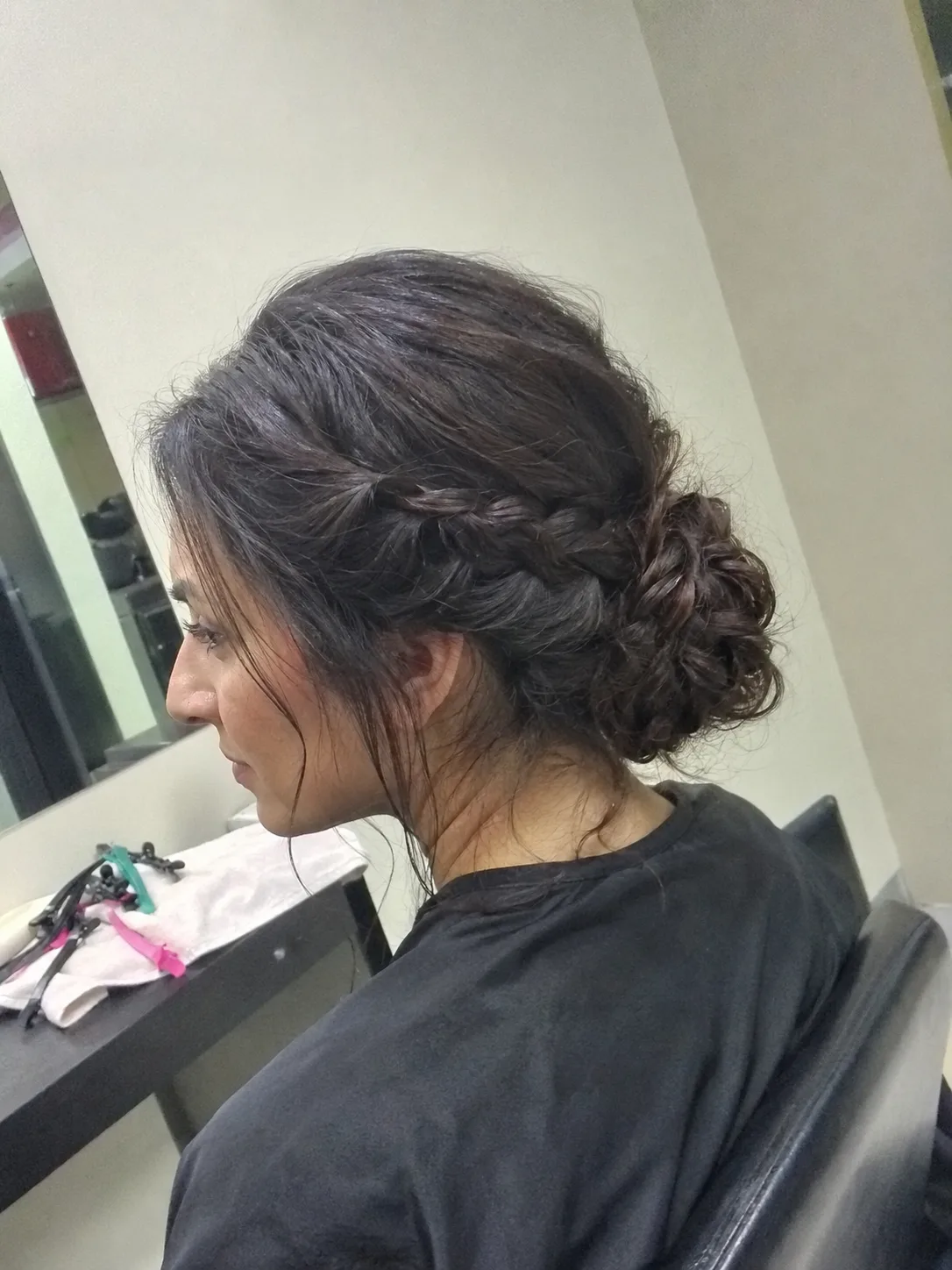 Authentic middle ages braided crown updo featuring symmetric historical plait work and a clean center part.