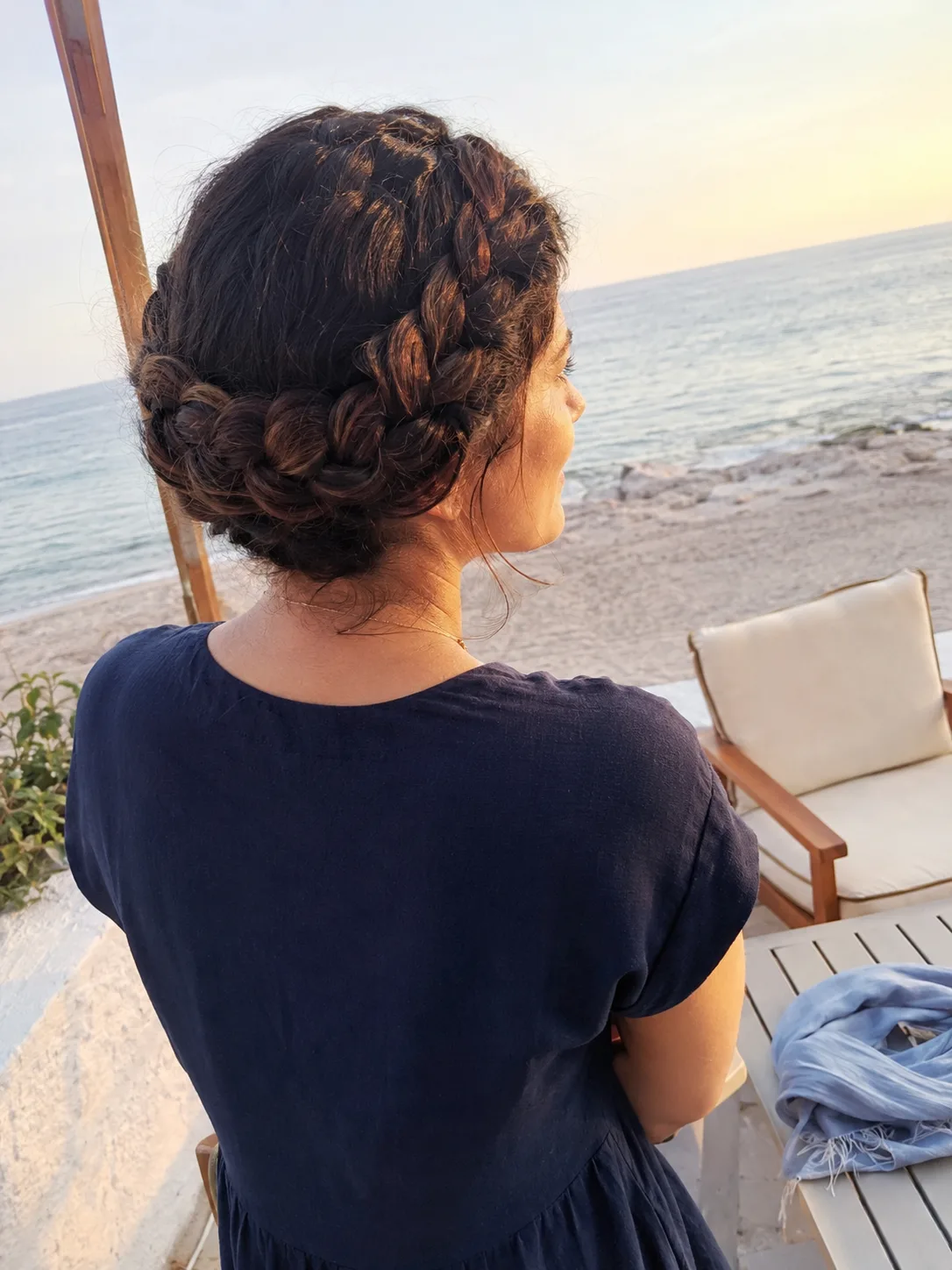 Braided beach updo for long hair in wind