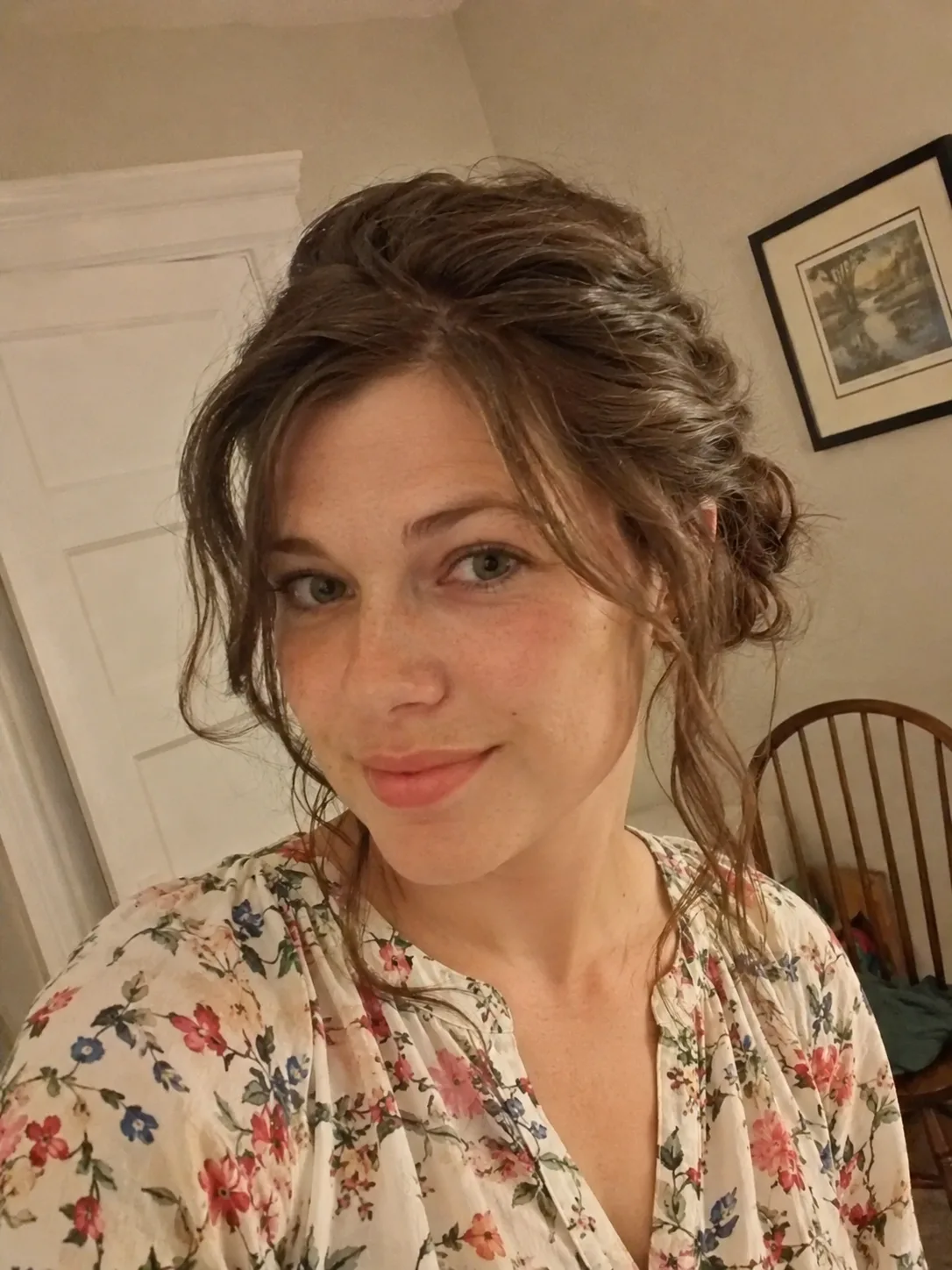 Braided low bridesmaid chignon with secure nape placement