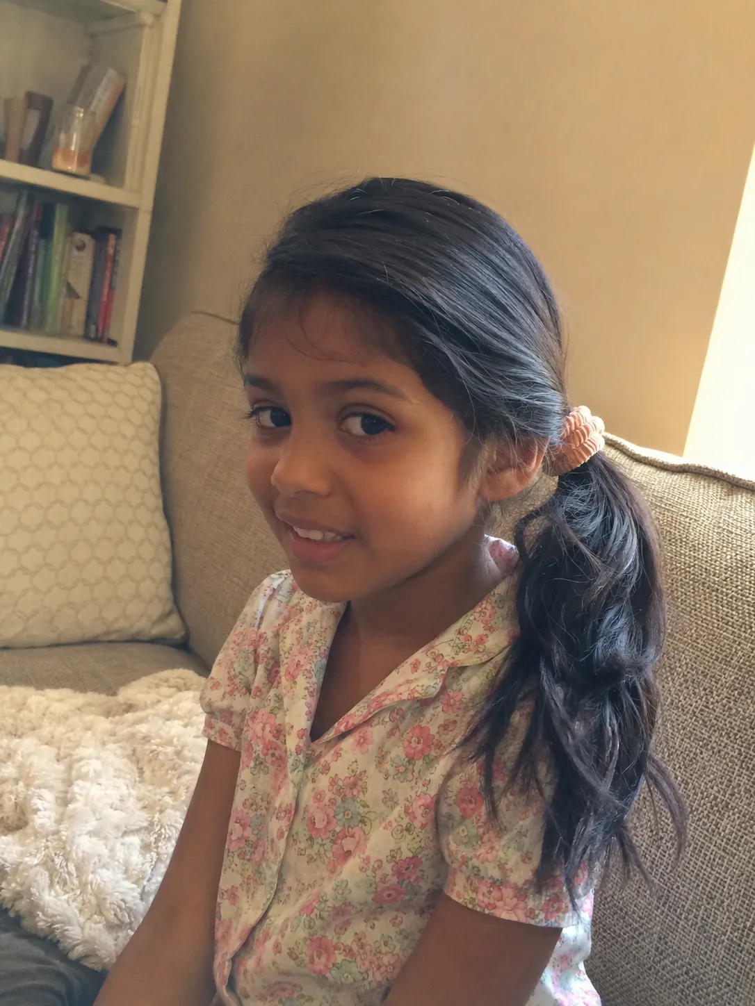 Clean blunt-cut line on fine kid's hair providing weight and structure