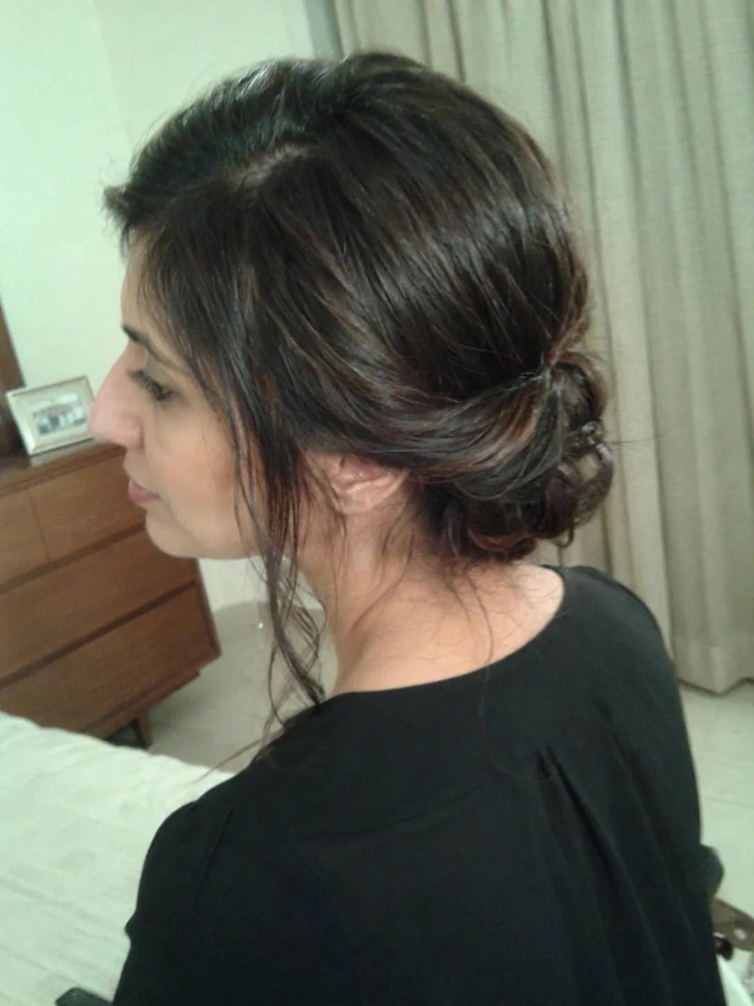 Close up of soft relaxed face-framing waves separated naturally at the hairline for an elvish look