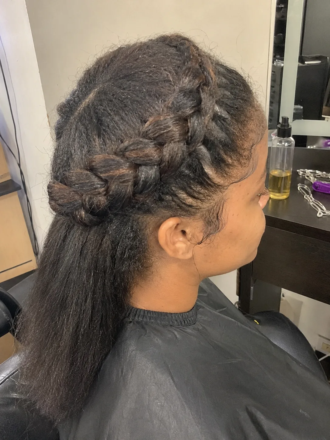 Close up view of matte textured elvish braids with clean root control and no excess product shine