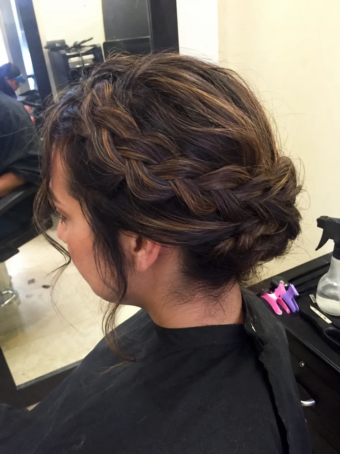 Editorial style elvish updo reference photo featuring sharp braids and curved face-framing sections