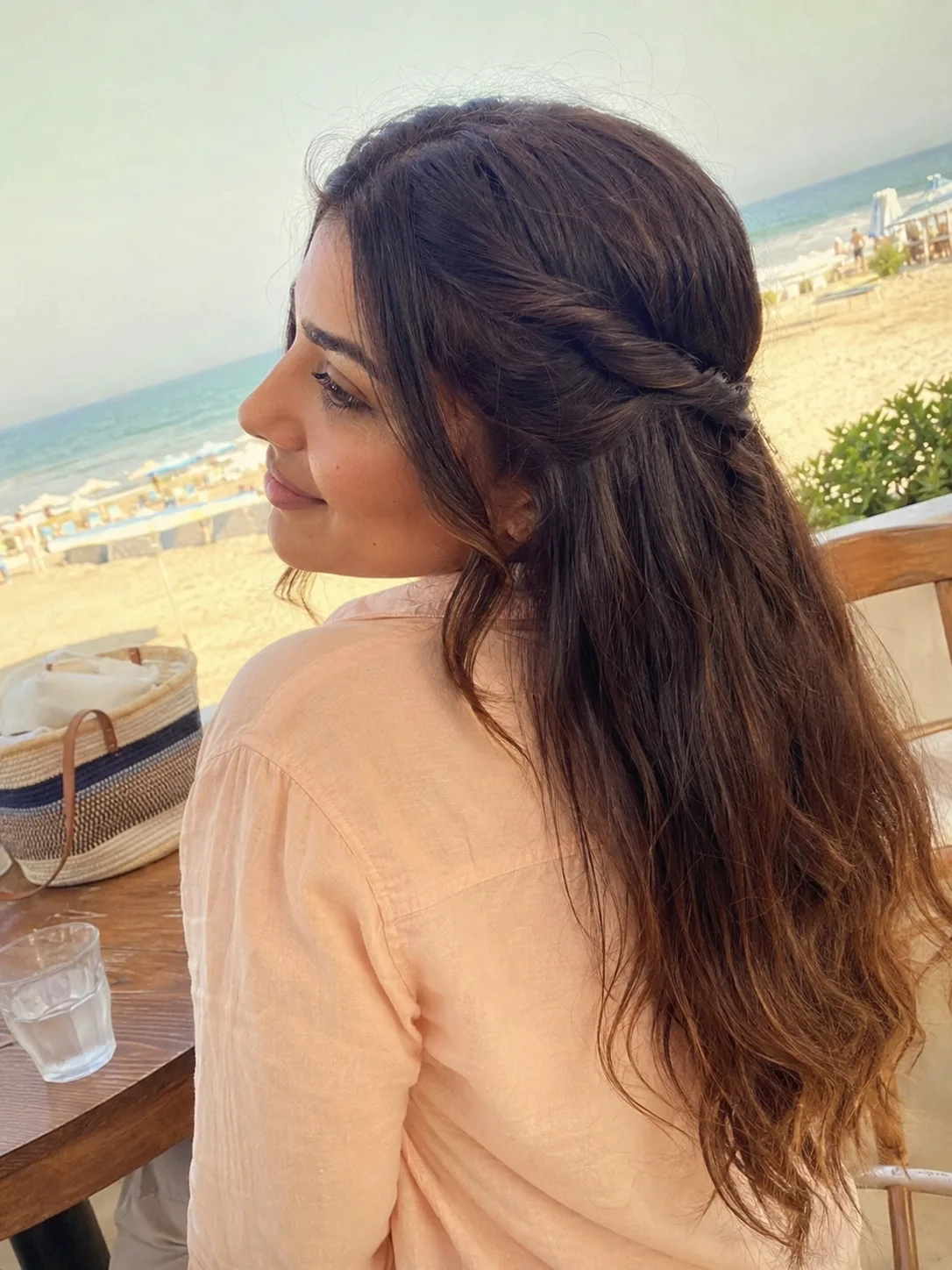 Half up twisted beach hairstyle for long hair