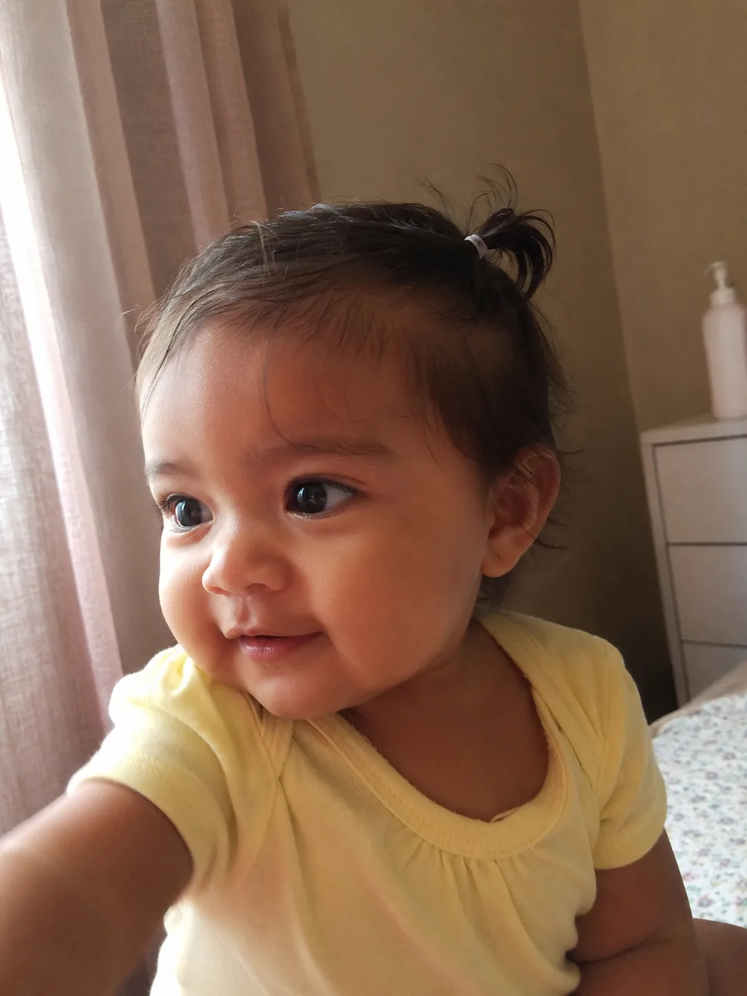 Healthy baby hairline resting completely free of hair clips or tight elastics