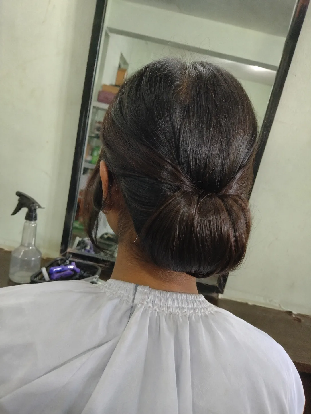 Long half up curly prom hairstyle with highlighted waves