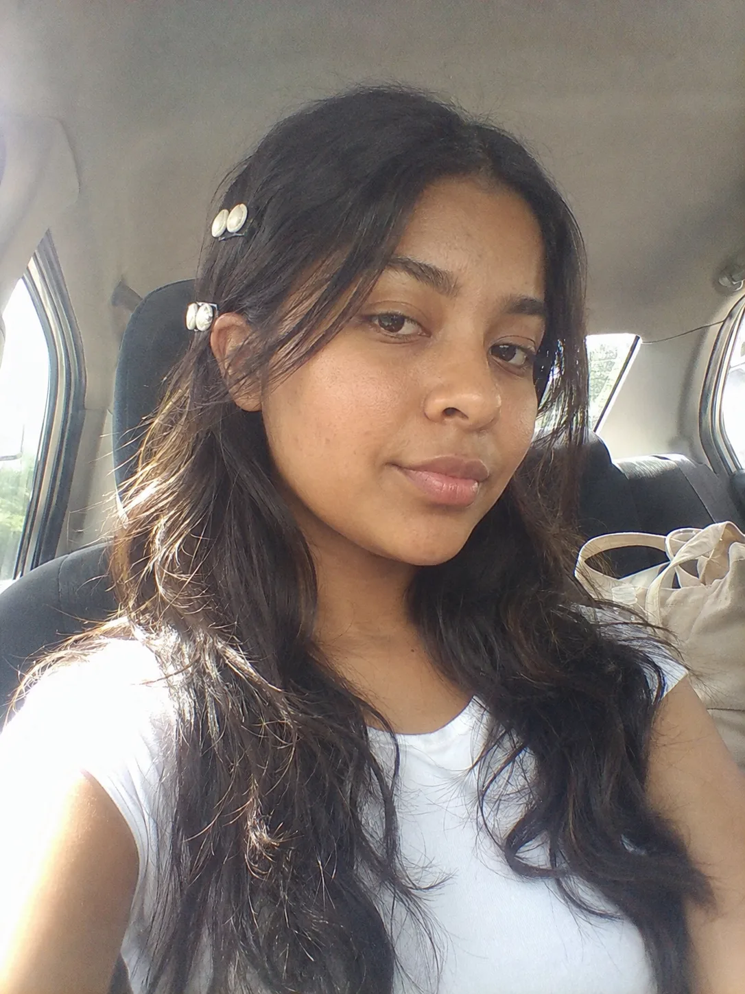Loose beach hairstyle with natural waves showing protected lengths and soft saltwater texture