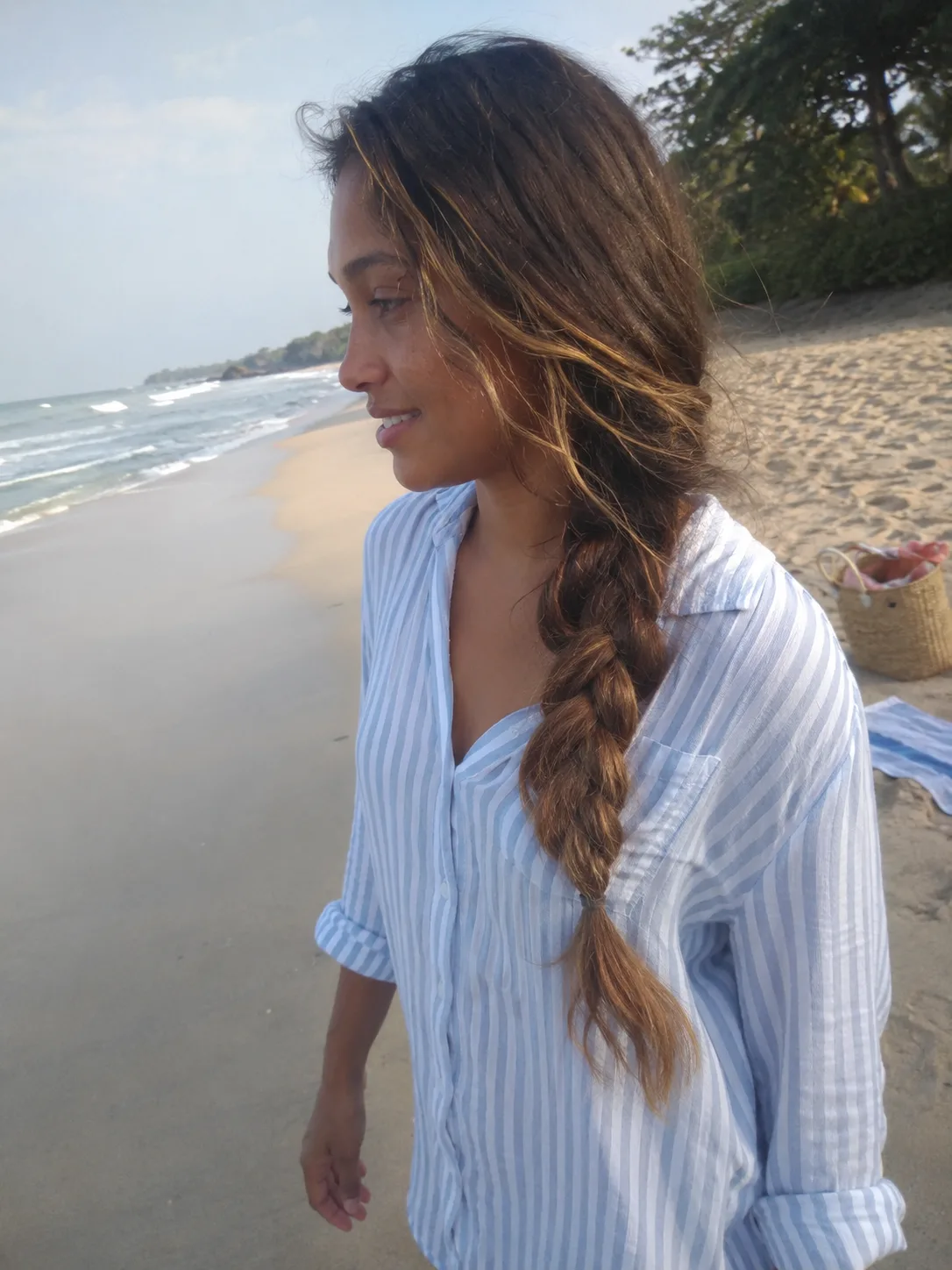Loose side braid hairstyle for long beach hair