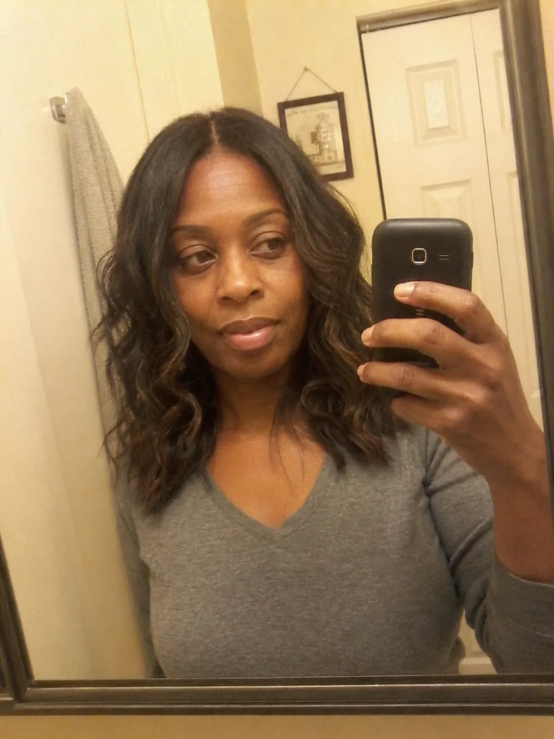 Medium brunette beach waves with soft layered section movement