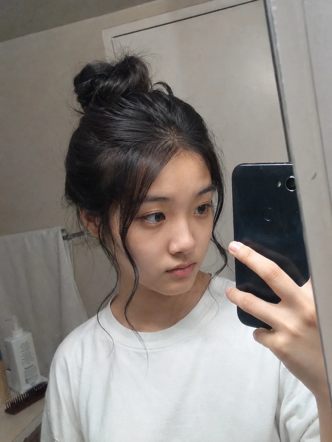 Mini high bun prom hairstyle for medium length hair