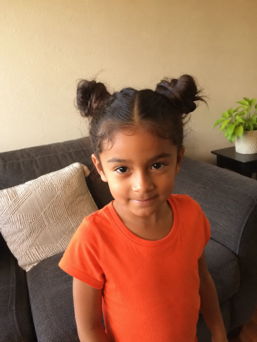 Natural untreated child's hair holding a secure braid base seamlessly without slipping