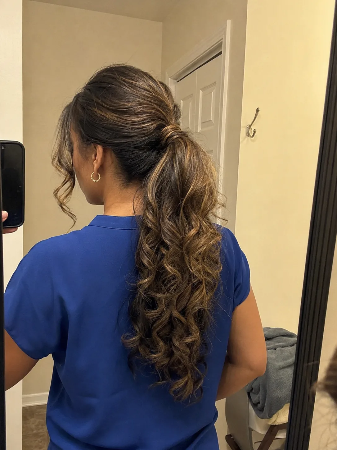 Naturally evolving long wavy wedding guest style looking exceptionally soft and effortless