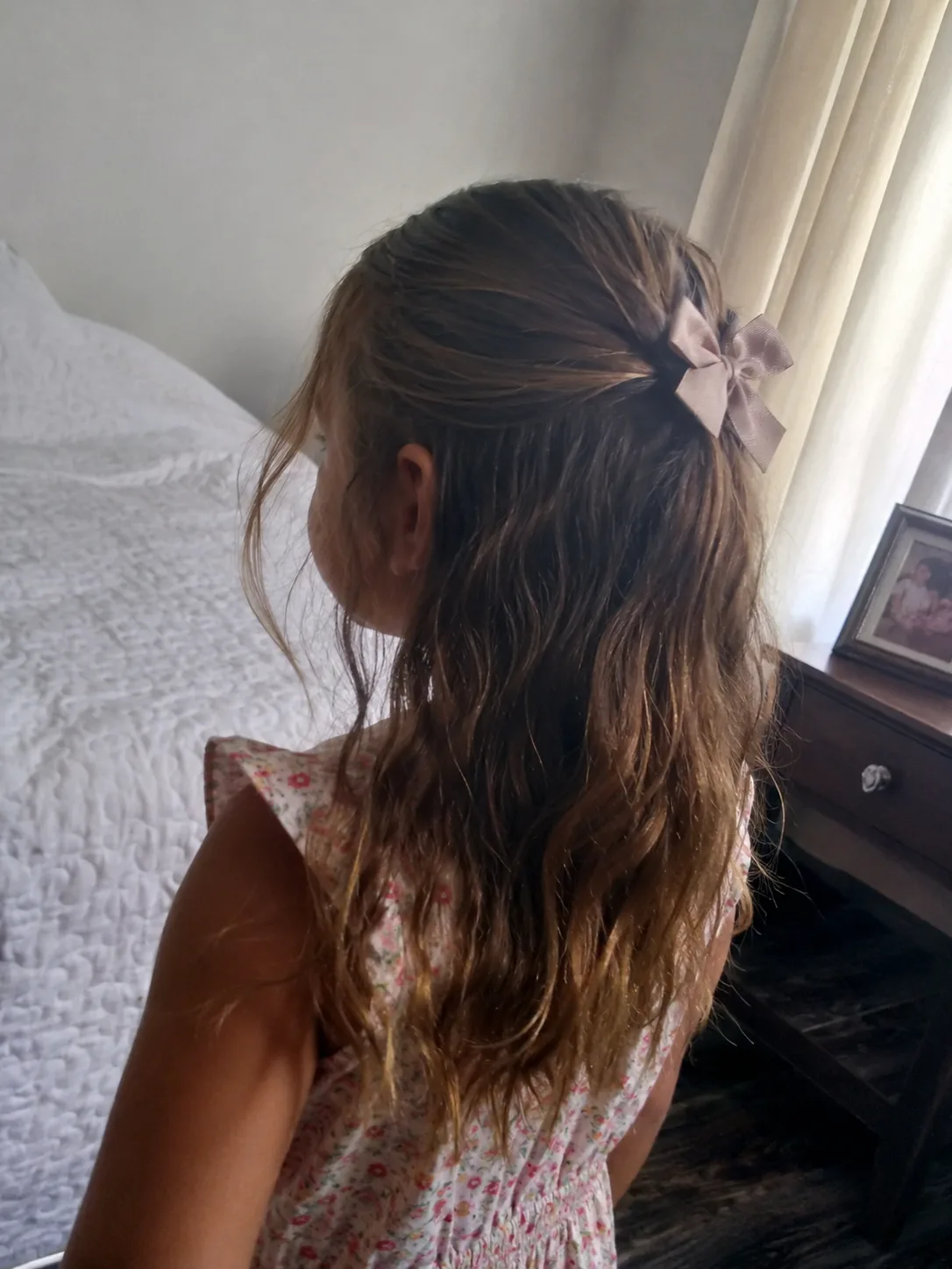 Neatly secured braided hairstyle for children with crisp, even parting lines