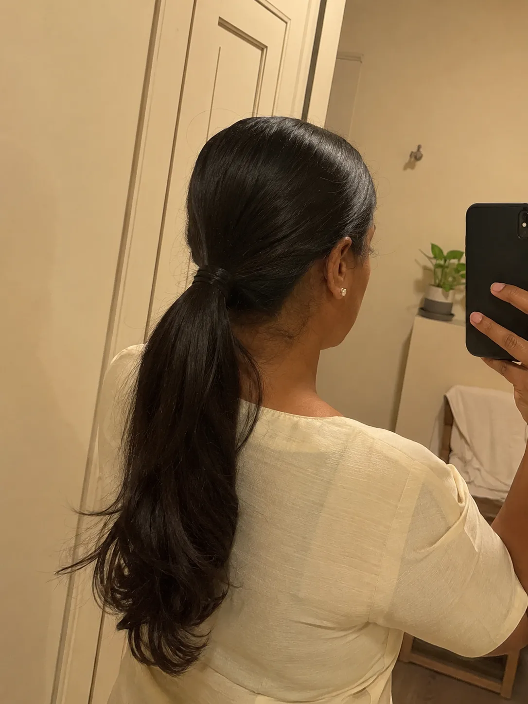 Pristinely conditioned long hair showing balanced texture and subtle sheen before wedding styling