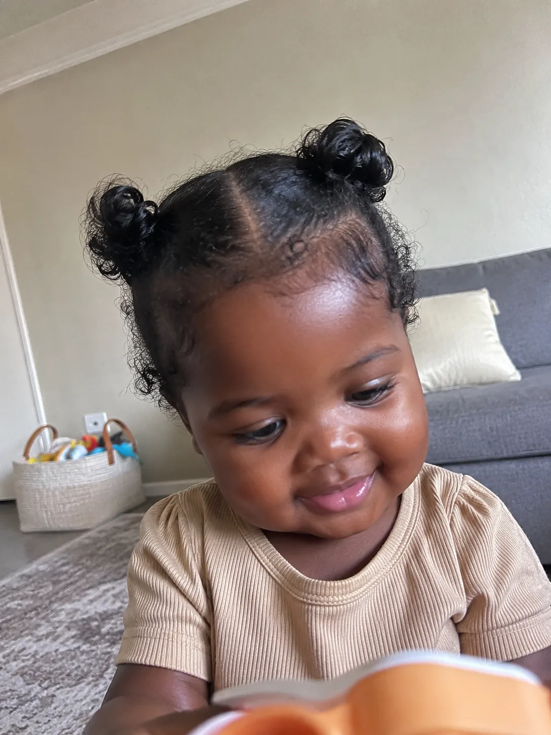 Quick and reliable low ponytail positioned securely at the nape of a baby's neck