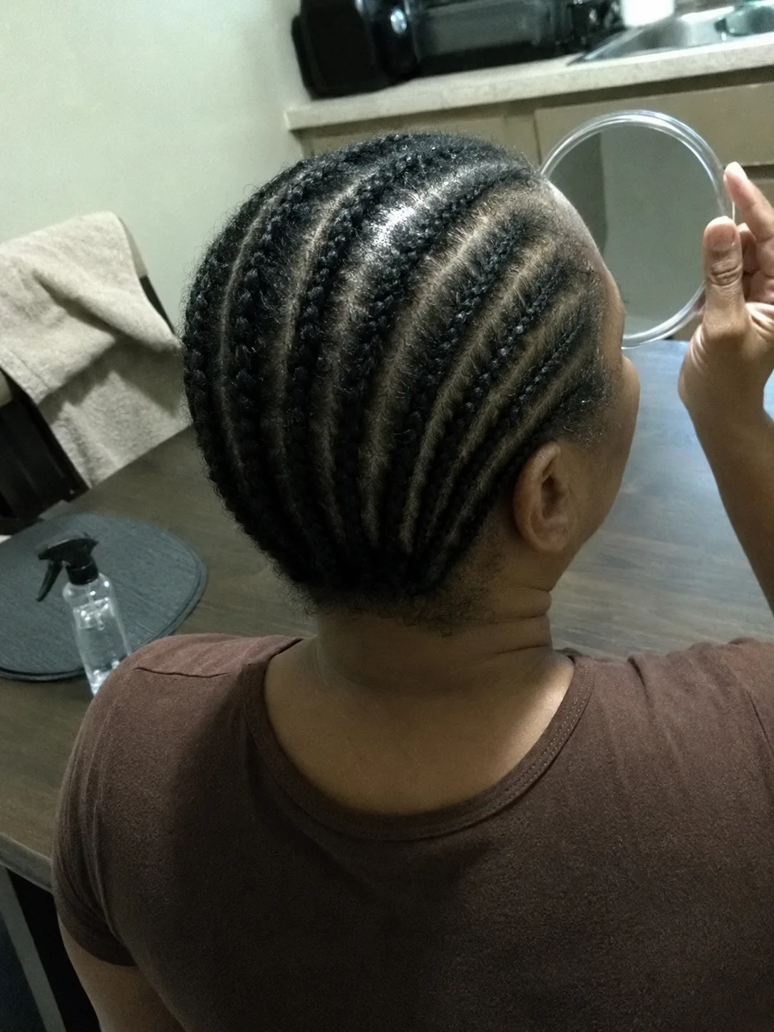Short straight back cornrows on natural hair for a simple summer braid style