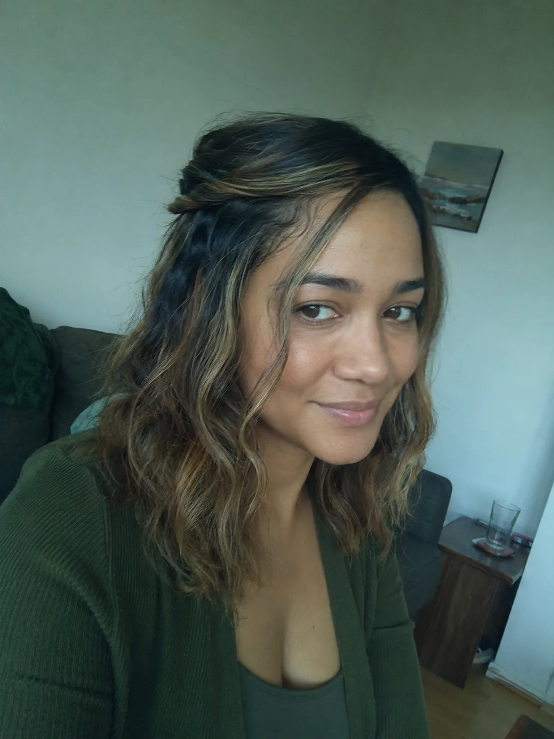 Side profile showing a braided half-up style to illustrate crown sectioning and lift