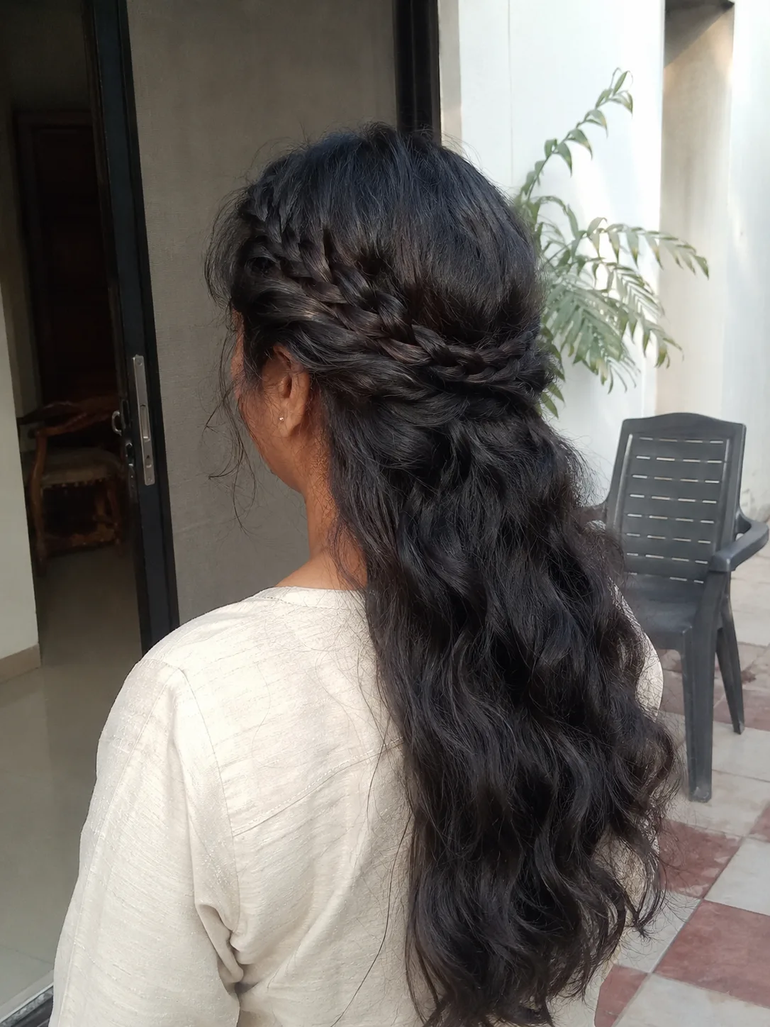 Side swept beach waves with soft highlights and natural humid texture