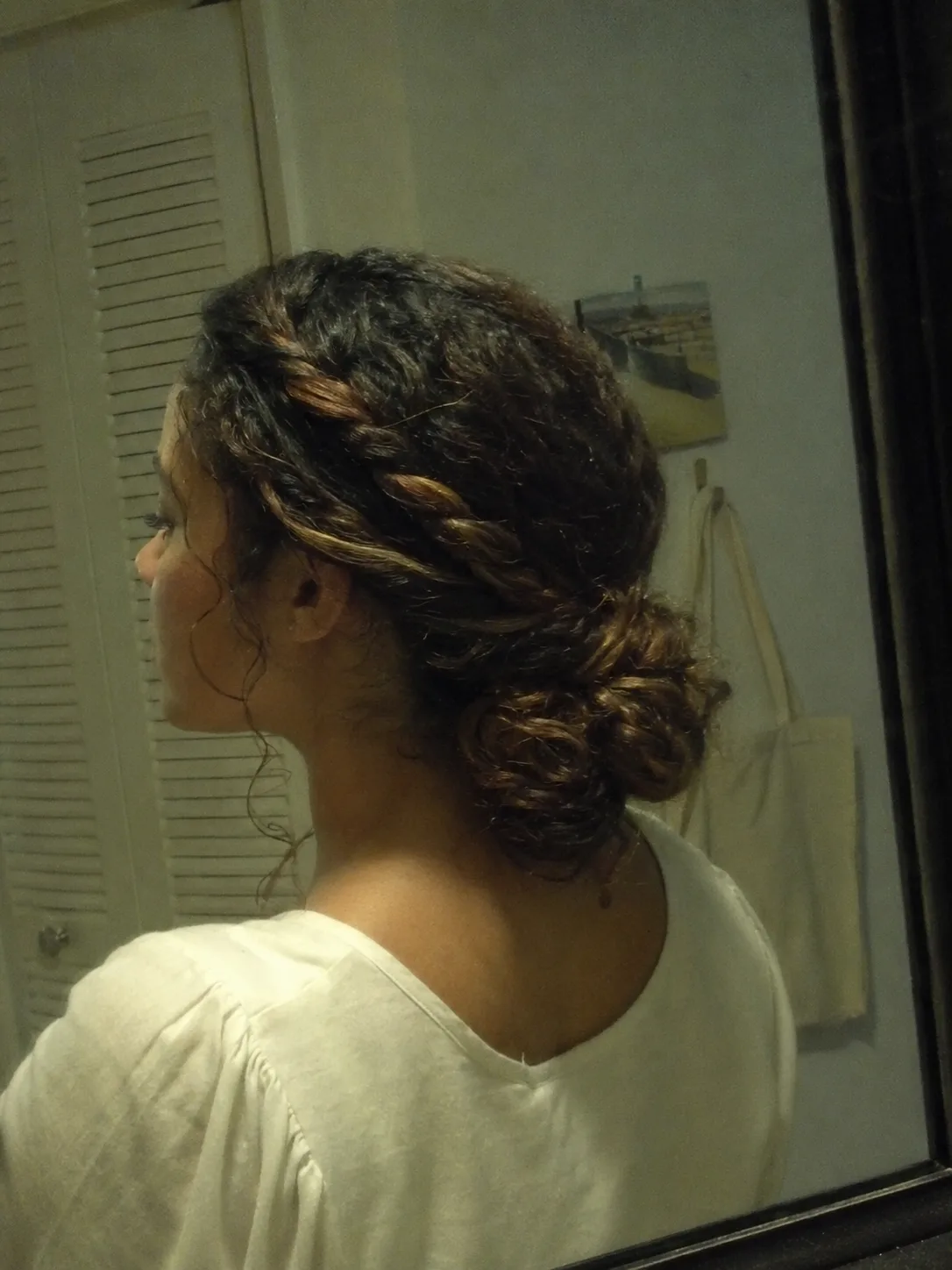 Side swept long prom hairstyle with soft face framing curls