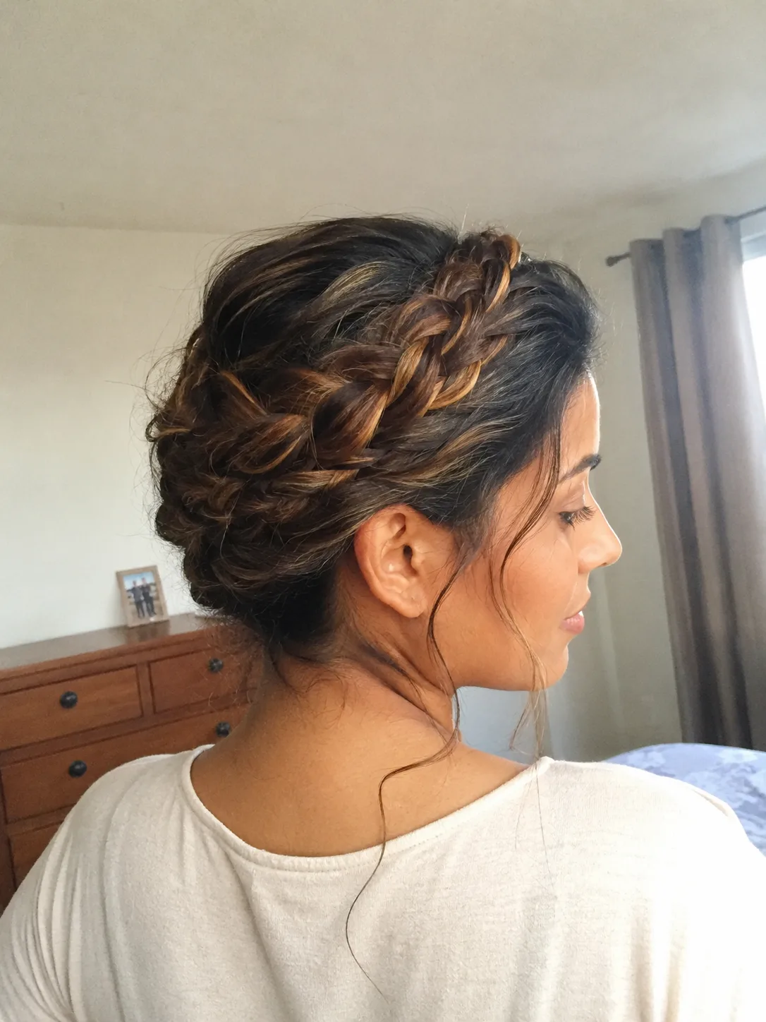 Side view of a textured hair look being adjusted quickly during a fast salon appointment session