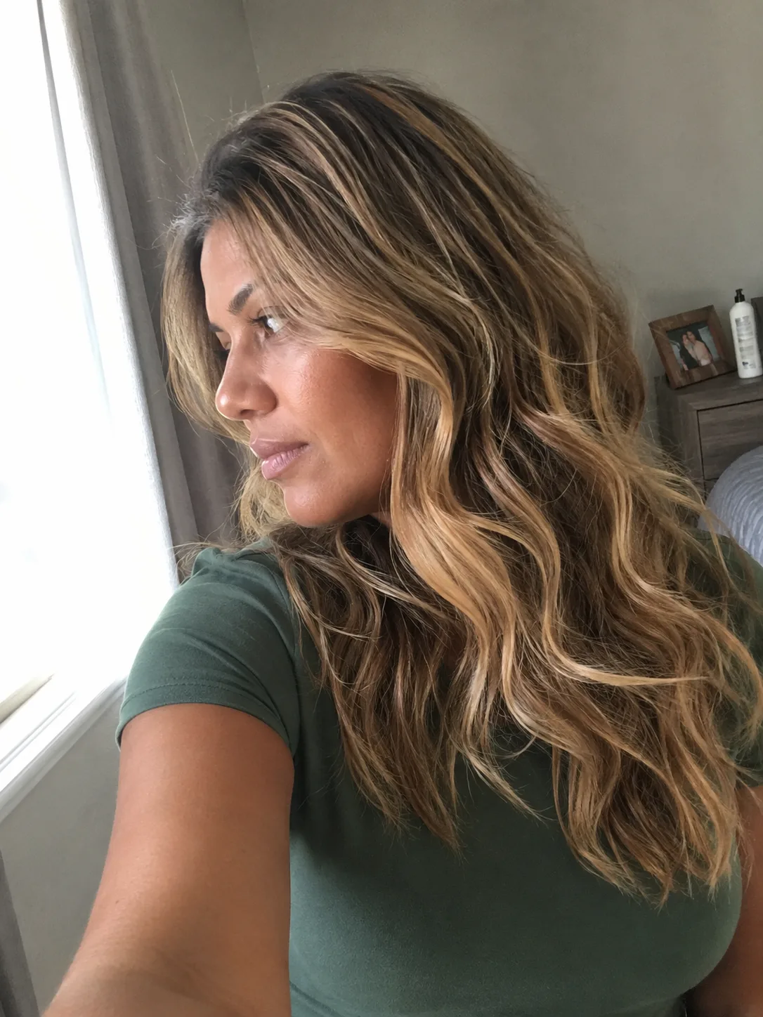 Soft natural brunette waves with loose lived in texture