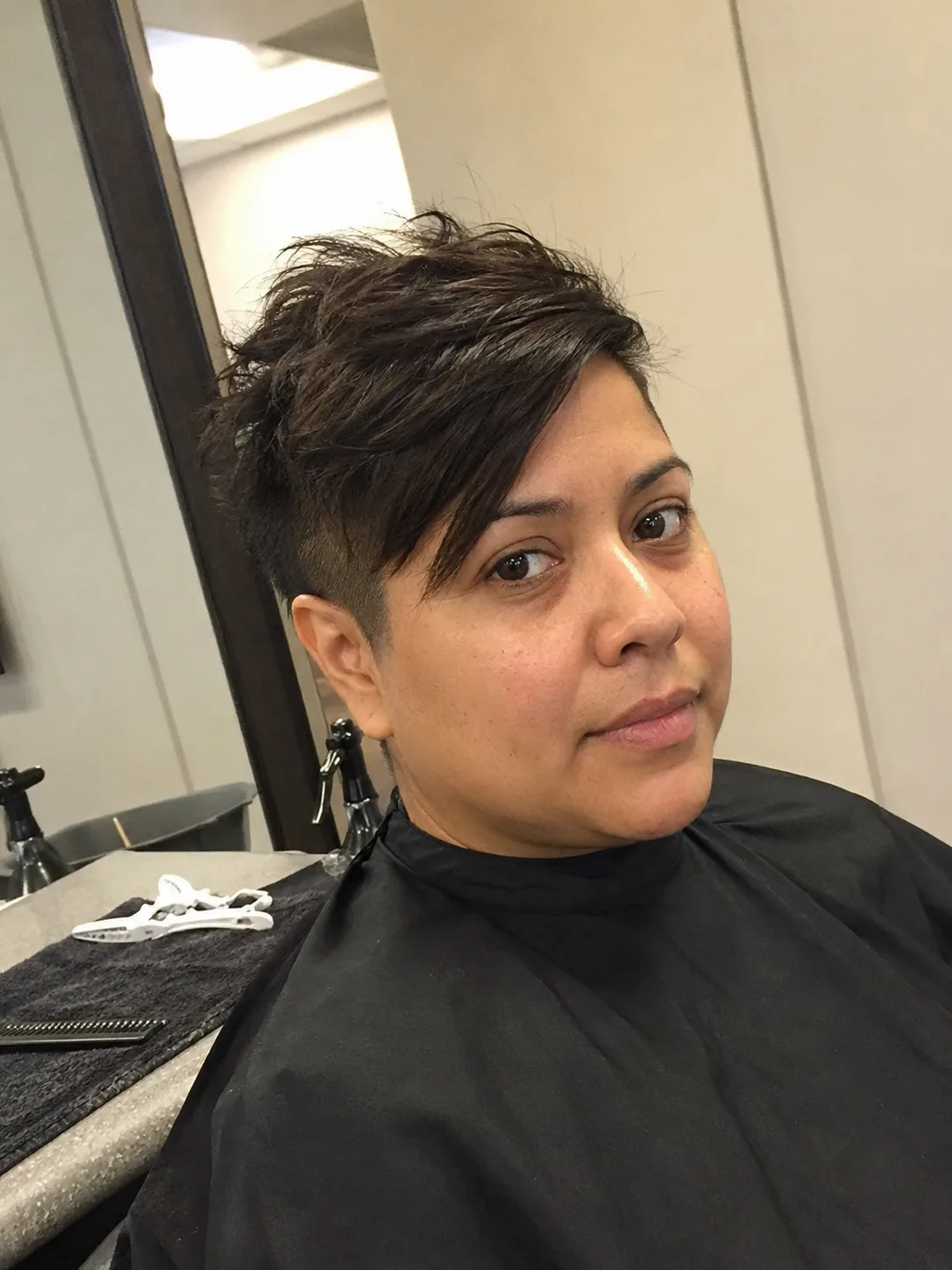 Soft undercut pixie for round face haircuts short with lifted side swept top