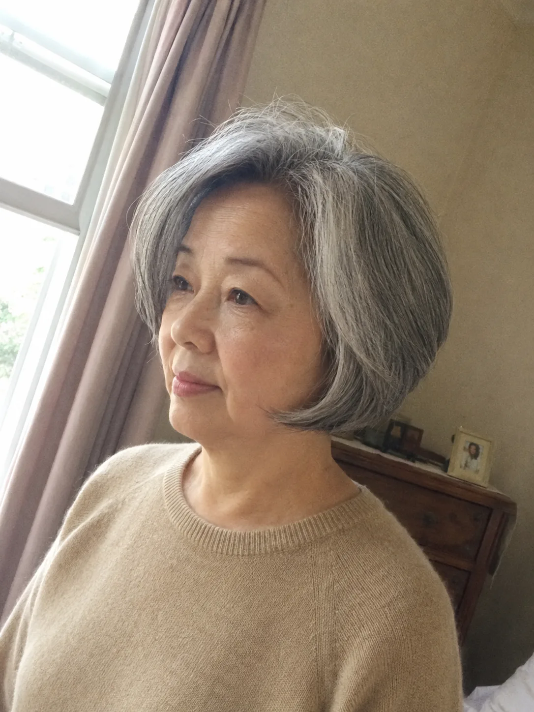 Softly scrunched and textured mid-length hair displaying light and airy movement