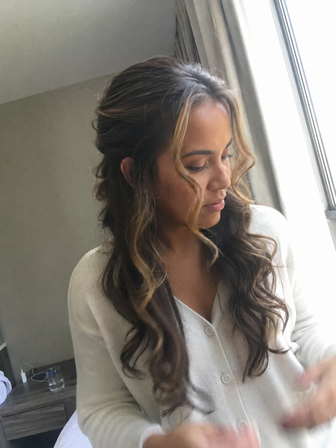 Stunning vertical twist updo on highlighted ash-blonde hair showcasing clean structural symmetry