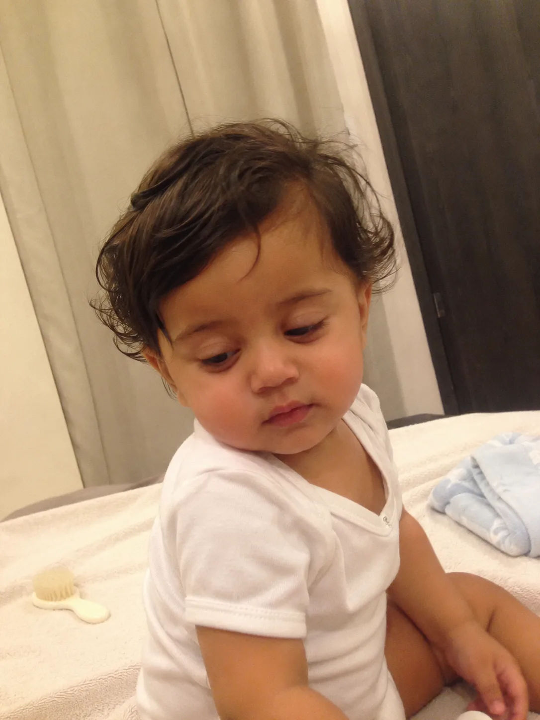 Tidy and naturally blunted ends on a toddler's fine hair after an initial grooming session