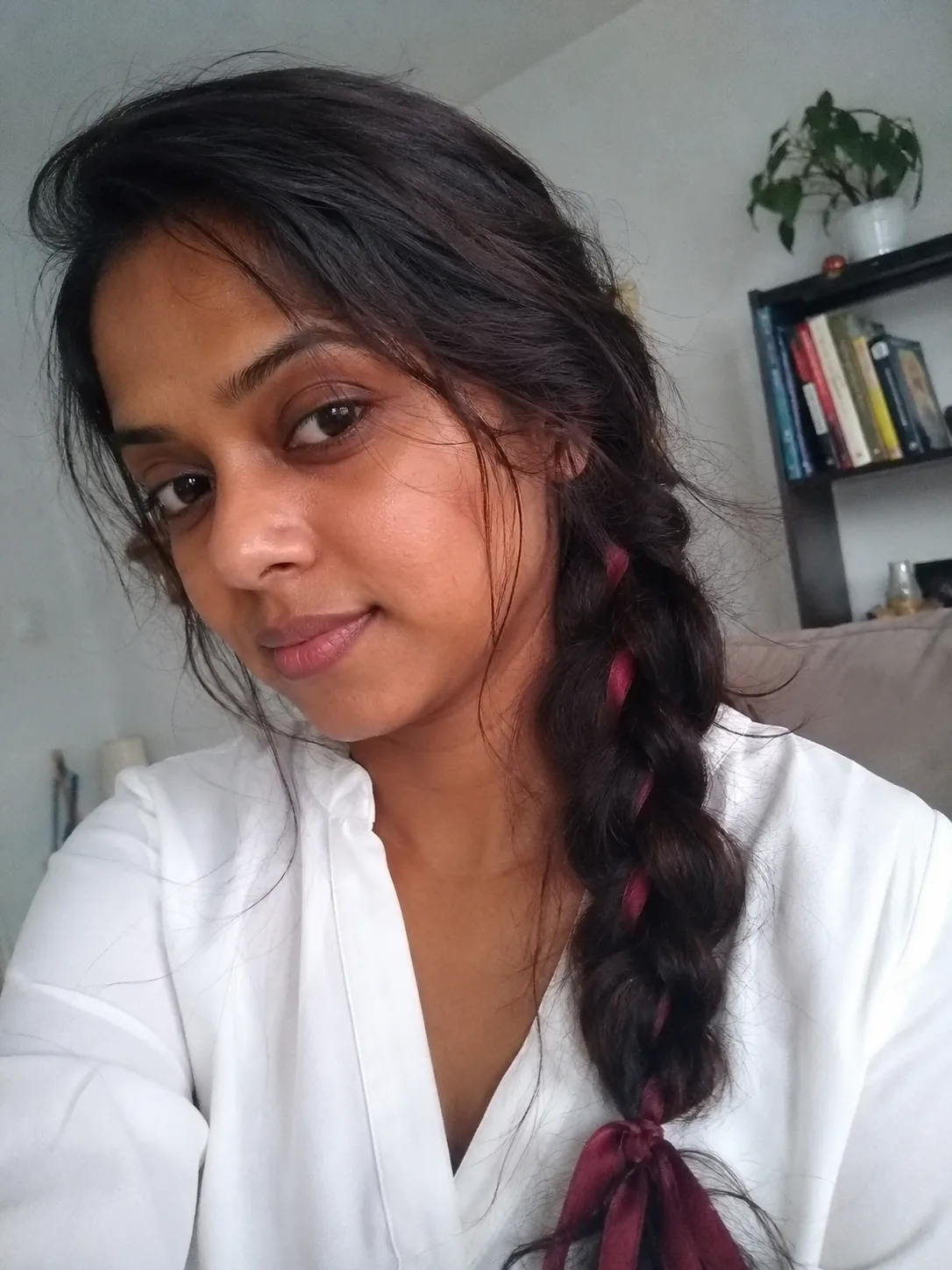 True medieval style hairstyle with visible side braiding and uncovered hair length