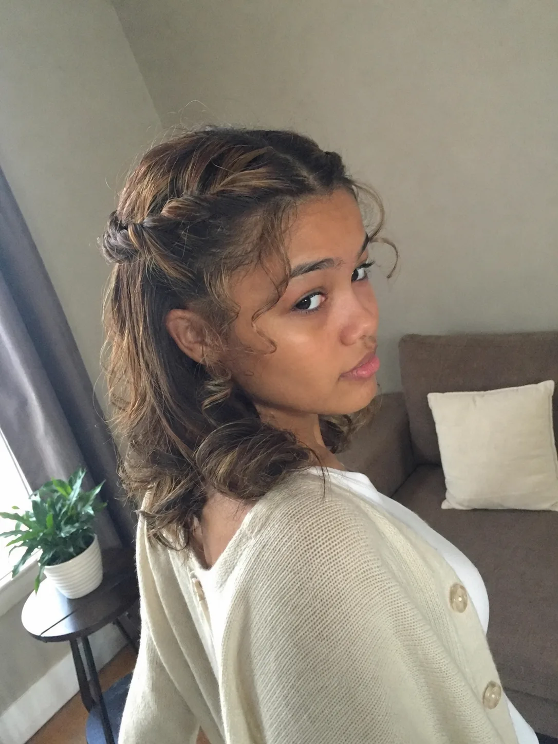 Twisted crown half-up prom hairstyle for medium length hair