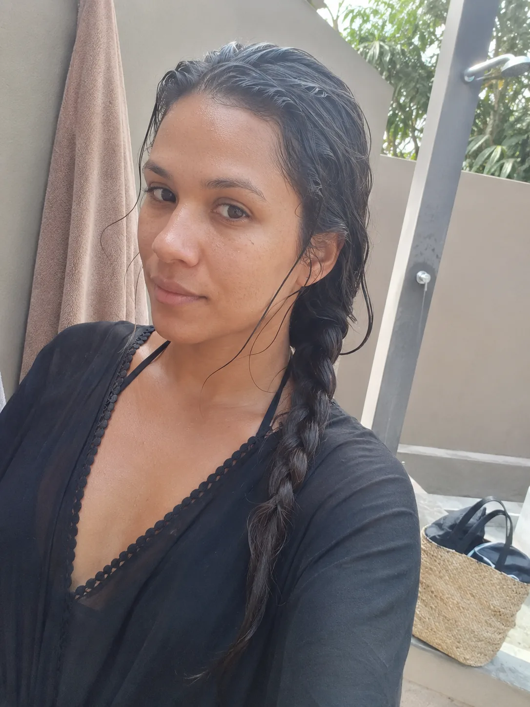 Wet braid hairstyle after swimming at the beach