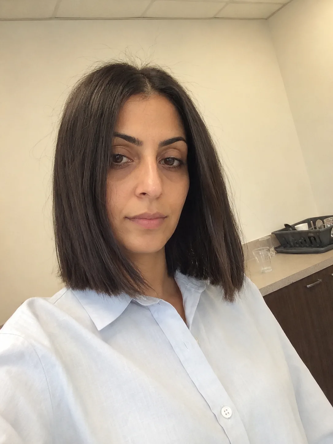 blunt bob haircut for women with clean straight perimeter