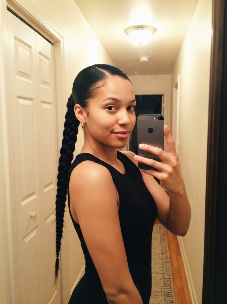 Braided ponytail hairstyle showing detailed braid texture and smooth clean parting