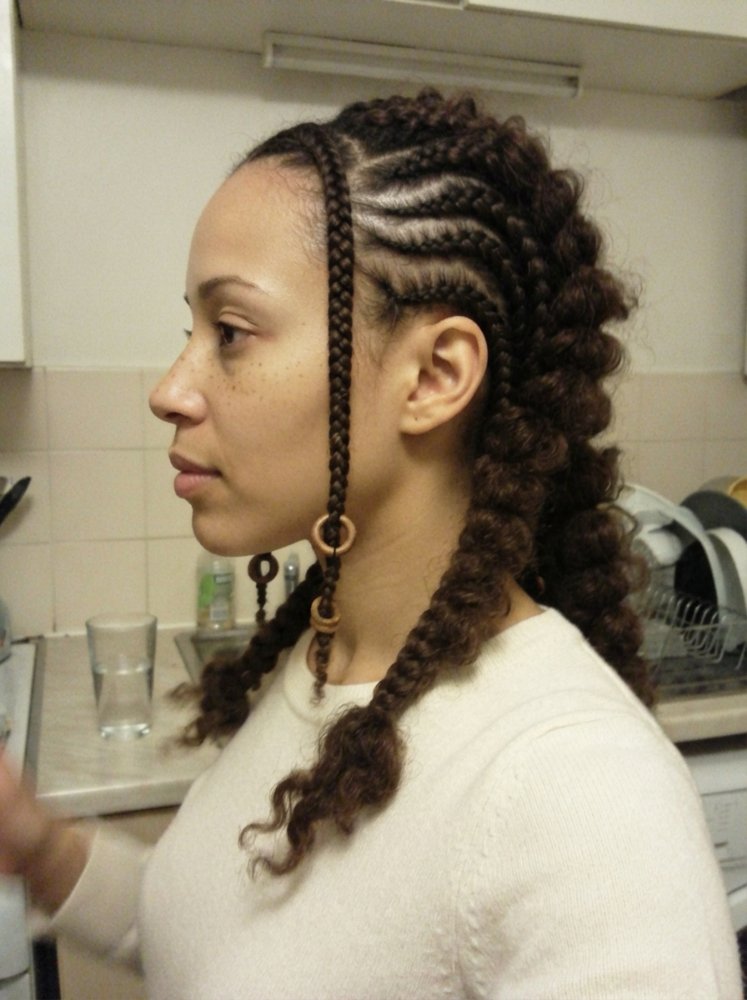 Fulani braids hairstyle featuring precise braiding and a long lasting neat look