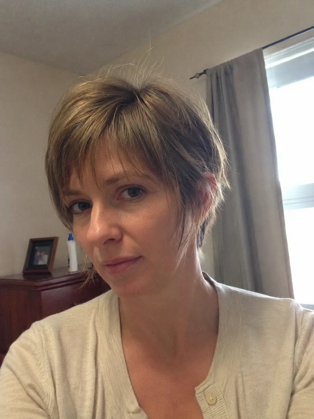 layered short bob haircut for women with soft grow out shape