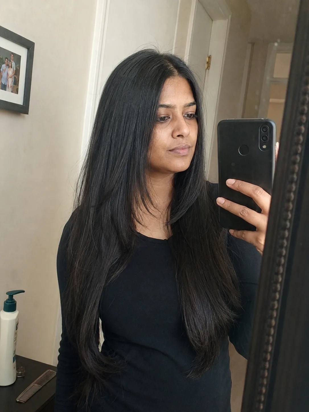 long dark hair with soft layers and smooth natural movement