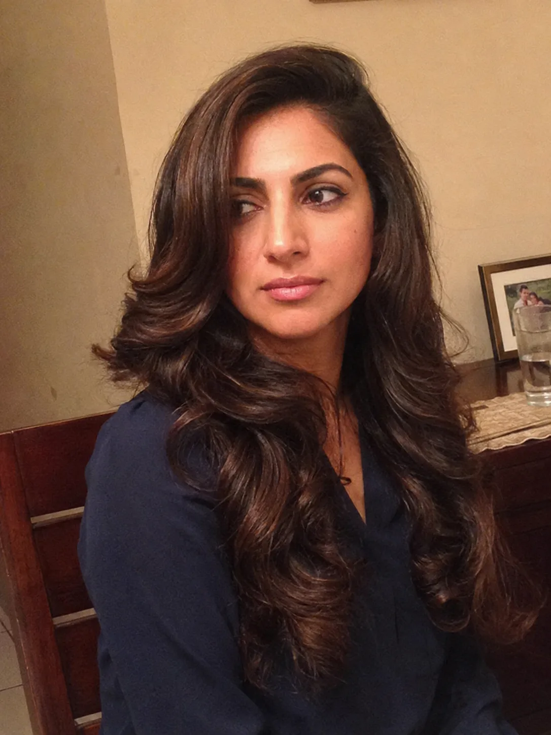 long layered brunette hair with polished blowout shape