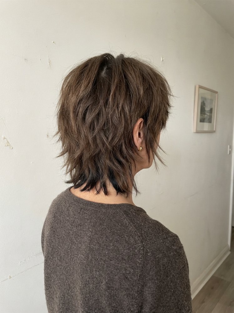 Dark Brown hairstyle with textured, natural, piecey texture