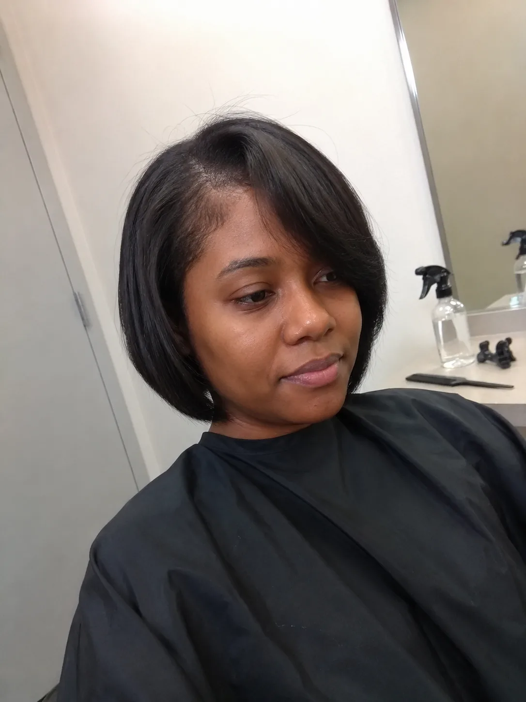 short Korean bob in salon with side bangs and smooth lightweight finish